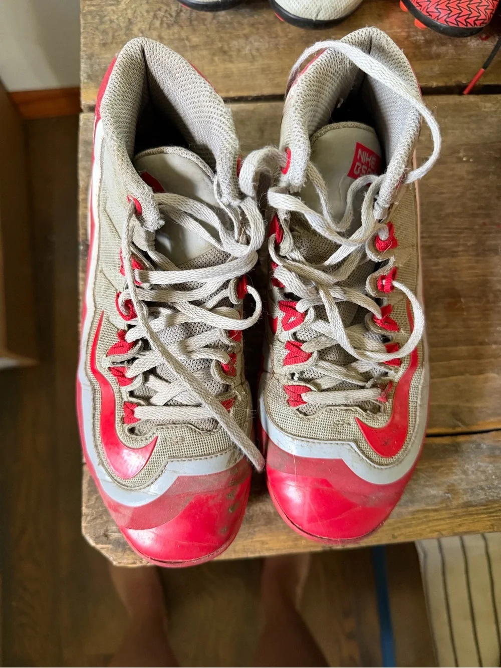Gray and Red Nike Baseball Cleats